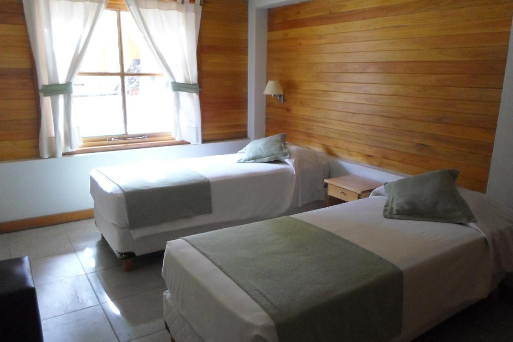 Apart Hotel Robles Del Sur San Martin de los Andes Ruang foto